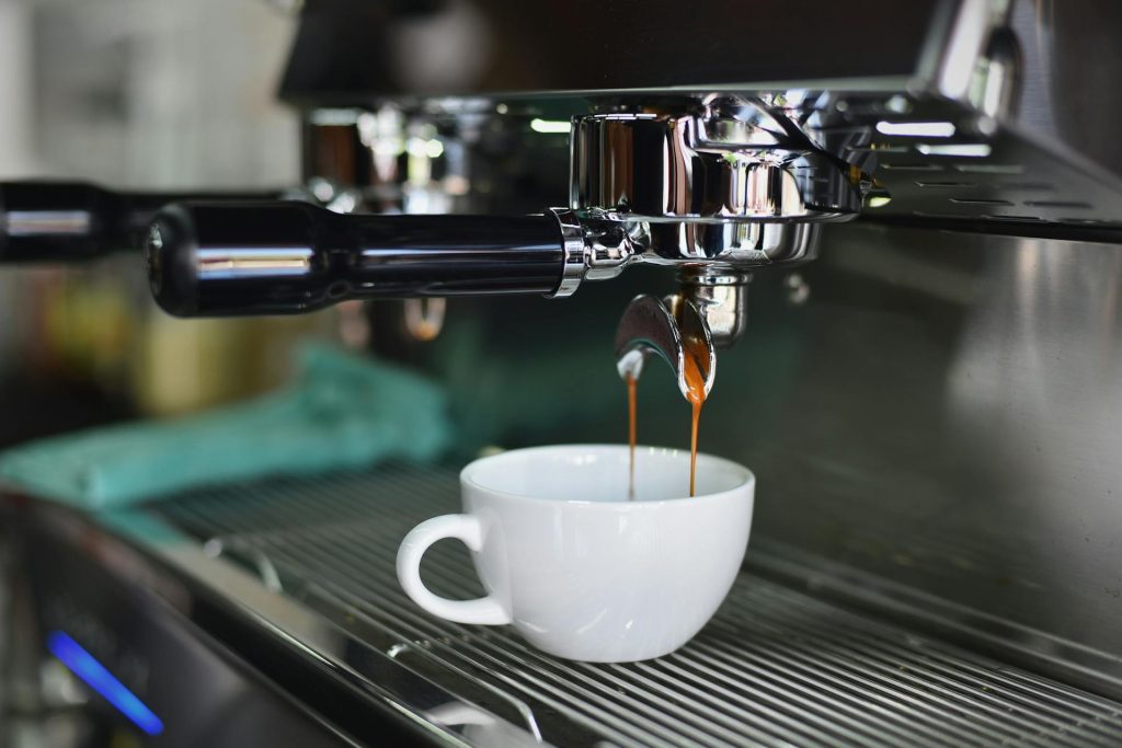 coffee cup on the espresso machine 